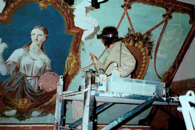 Restorers at work on the eastern wall of Napoléon Bourassa's studio