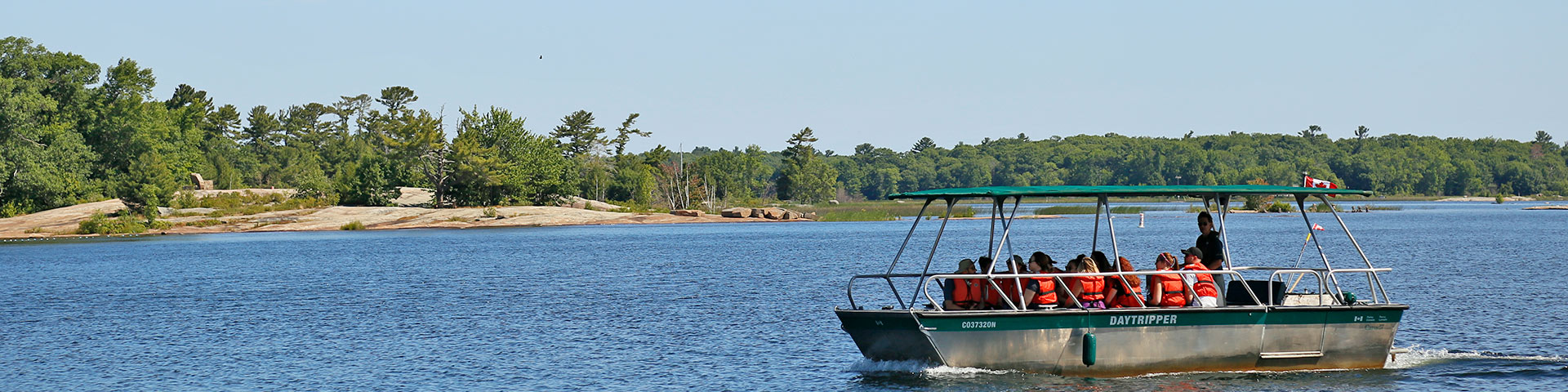 A boat transports passengers to an island.
