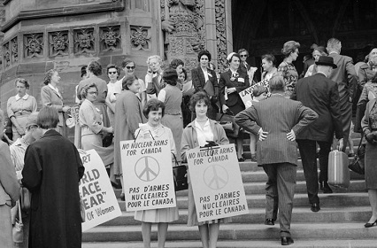 Women on the steps of Massey Hall