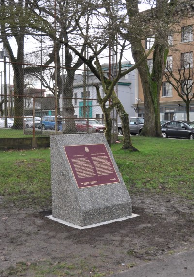 Bronze commemorative plaque on its stand