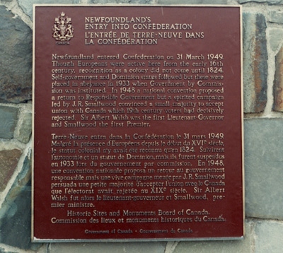 Bronze commemorative plaque on a wall