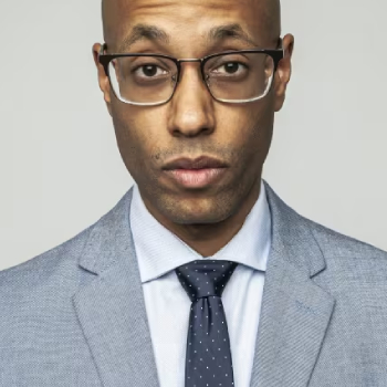 Front portrait of a person in a suit