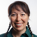 Portrait of a women in green uniform