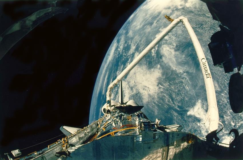 The Canadarm grapples the Hubble Space Telescope, 1990