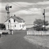Farm in rural Prairies from the 1950s with electric posts and installations