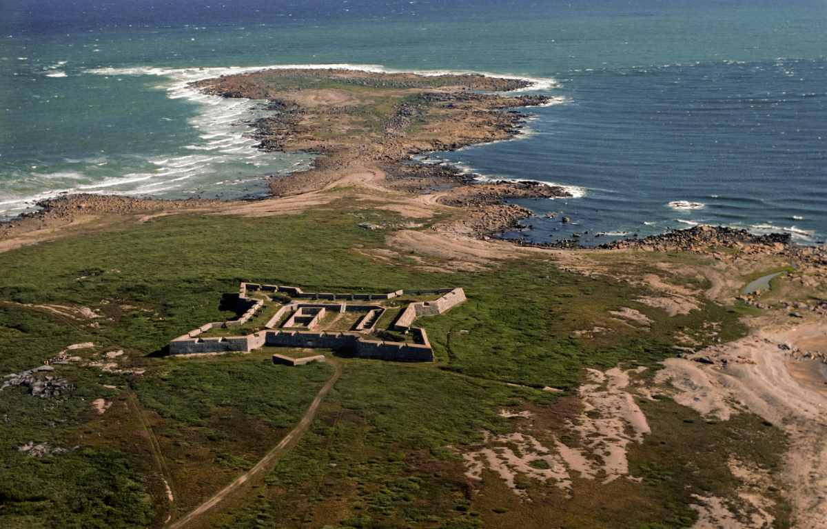 View of landscape including land, water and a fort