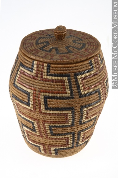 A woven basket with geometric designs