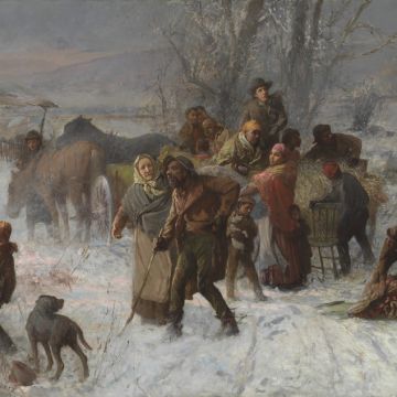 Un groupe de personnes dans une ville enneigée