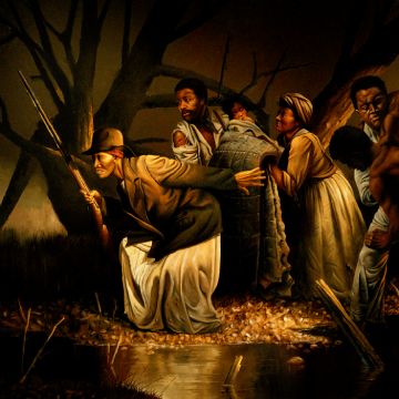 Un groupe de personnes essayant de se déplacer sur un chemin