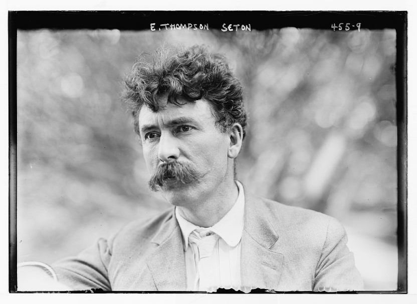 Black and white photo of a man wearing a moustache