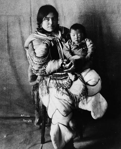 Photo by Geraldine Moodie of Ivalik woman, Kookooleshook, and child, 1904
