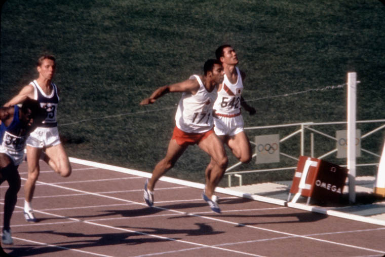 Multiple men during a running race