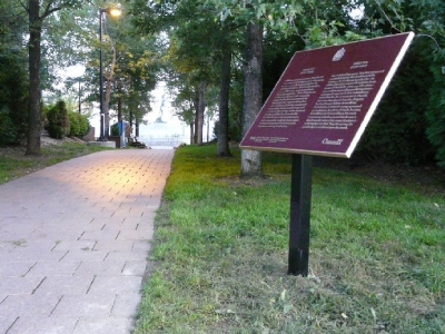 Photo of a plaque on a pathway