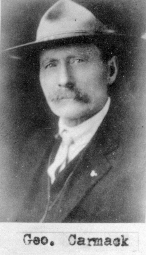 Black and white portrait of a man with a hat