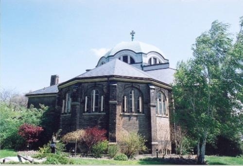 Part of a church, view from the back, and blue sky