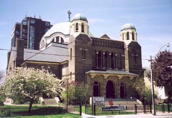 Front view of a church with blue sky