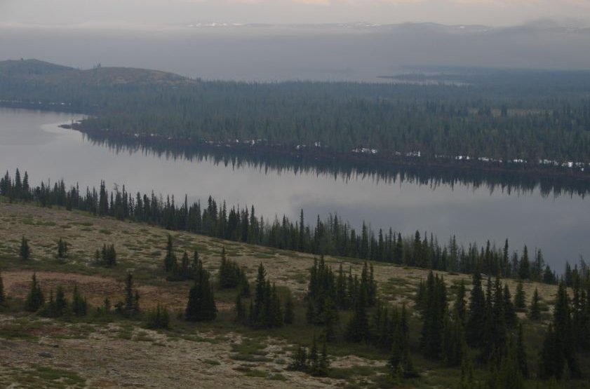 Image of a landscape showing water and a mountain