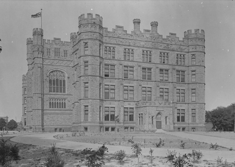 Black and white photo of a large Gothic building, the Victoria Memorial Museum, designated as a national historic site