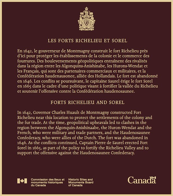 Bronze commemorative plaque with gold text