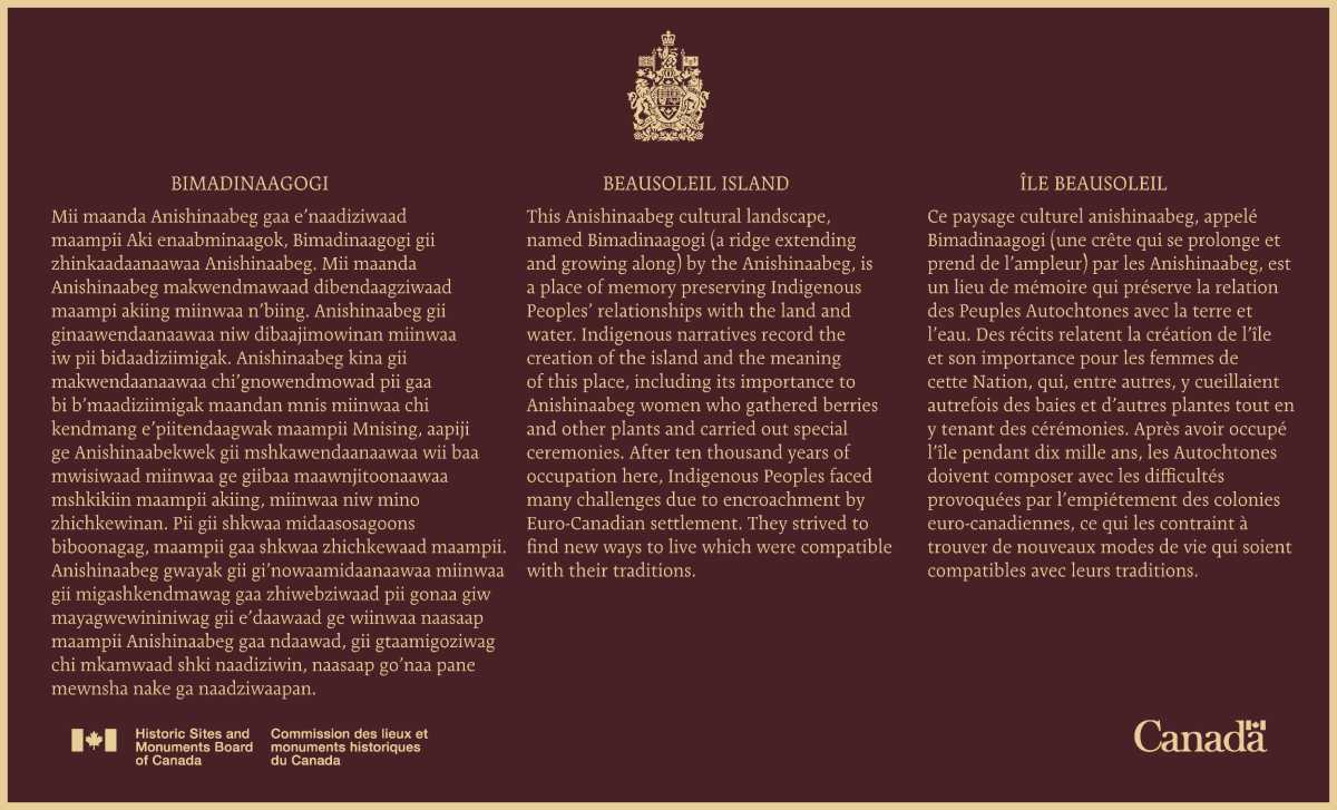 Commemorative plaque highlighting the historical importance of Beausoleil Island as a national historic site