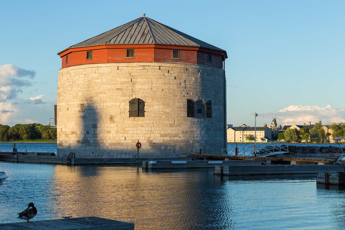 A circular tower beside the water