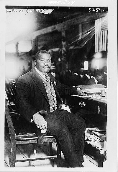 Historical photo of a man sitting at a desk