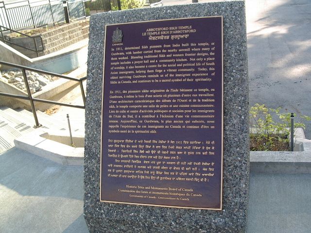 Commemorative bronze plaque on its stand