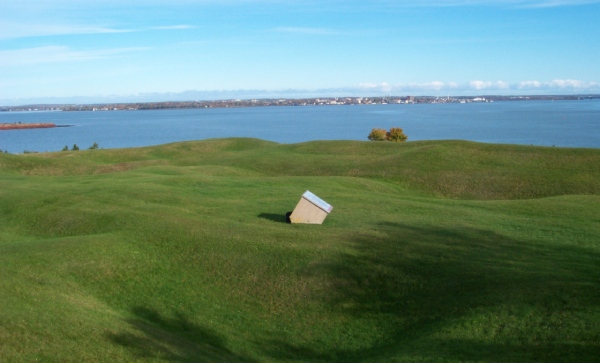 Landscape with grass and view on water