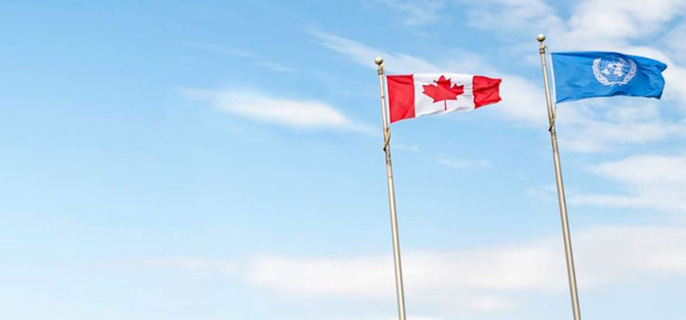 Canadian and UNESCO flag flying