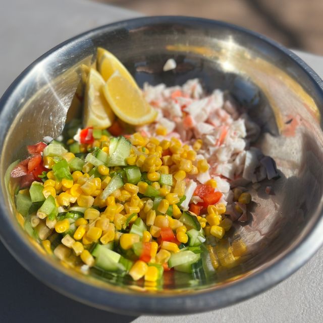 A bowl filled with the imitation crab mixture for the sandwiches.