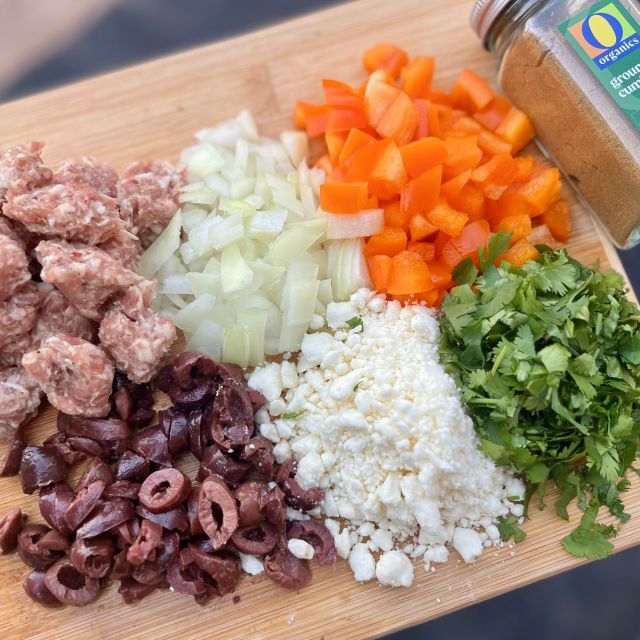 Raw ingredients displayed on a cutting board.