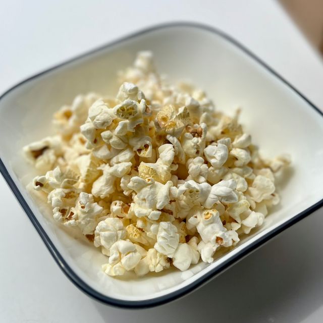 A bowl of popped popcorn.
