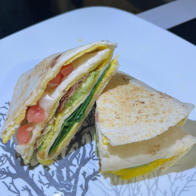 The finished wrap placed on a plate, ready to serve.