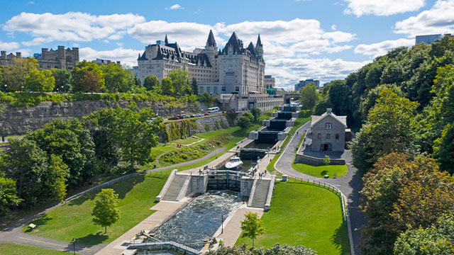 An aerial view of historic buildings and  Ottawa Locks at Rideau Canal.