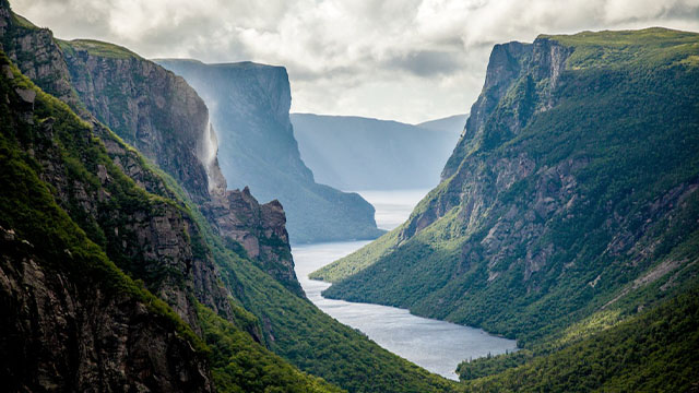 An aerial shot of a magnificent, big fjord in Gros Morne.