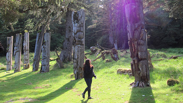 A Watchman with visitors at Gwaii Haanas National Park Reserve, National Marine Conservation Area Reserve, and Haida Heritage Site.
