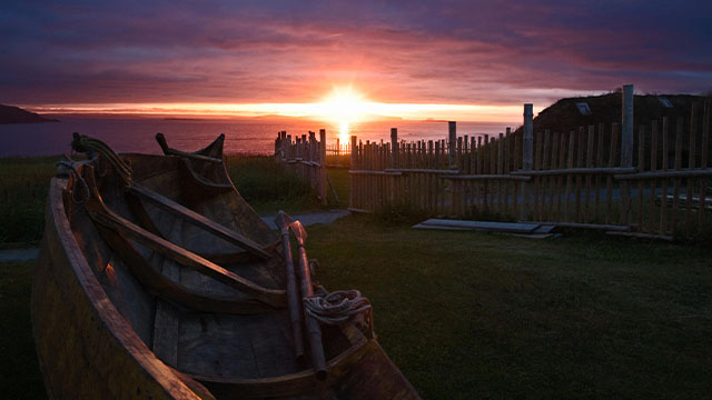 Sunset over the sea ae L'Anse aux Meadows National Historic Site.