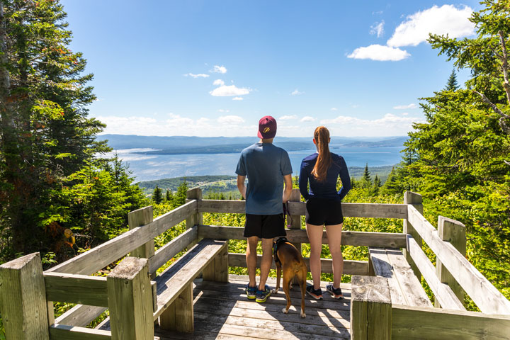 A couple admire the landscape from the Les Crêtes trail.