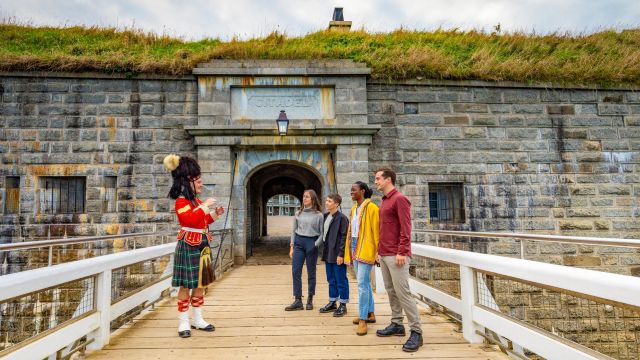 A military interpreter leading a guided tour of the Halifax Citadel.
