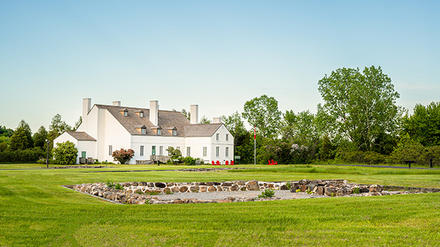 The Grande Maison of the Forges du Saint-Maurice National Historic Site in summertime