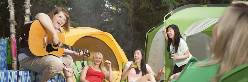 Women having fun camping.