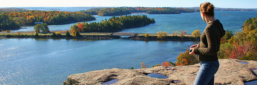 A woman at Landon Bay lookout at Thousand Islands National Park