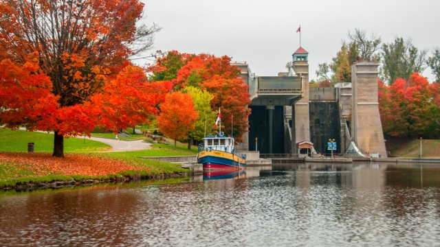 A boat moored next to Peterborough Lift Lock in the Fall.
