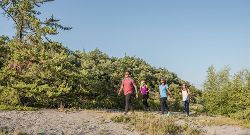 Visitors hike along the Gorge Creek Trail. Riding Mountain National Park.