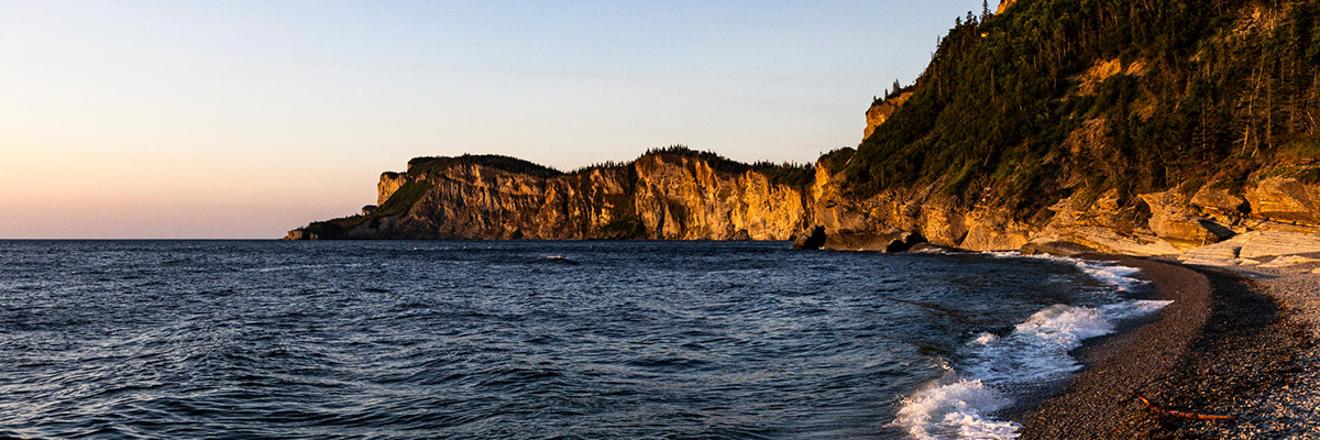 The cliffs of the Forillon Peninsula seen from Cap-Bon-Ami Beach in Forillon.