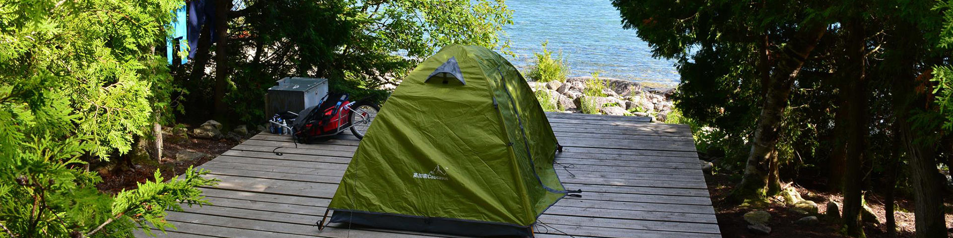 A tent along the shoreline.