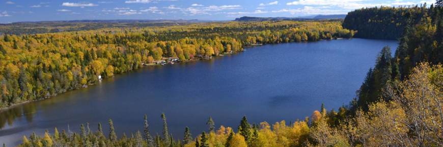 A lake in a wilderness setting.