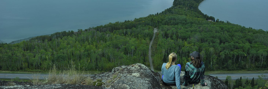 Two people looking at Lake Superior.