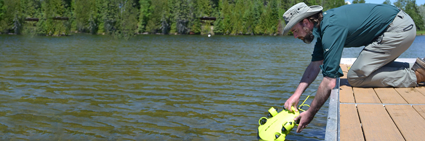 Parks Canada staff uses an under water drone. 