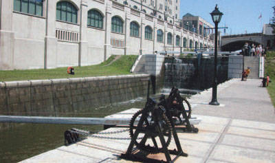 Stone masonry lock walls and cast iron hand-operated winches